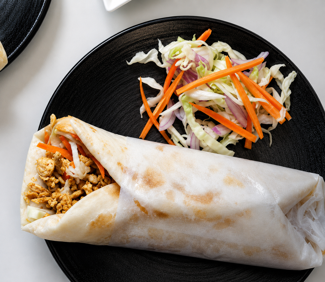 Soft Kubbos Roll filled with chicken at Mattathil Bakery